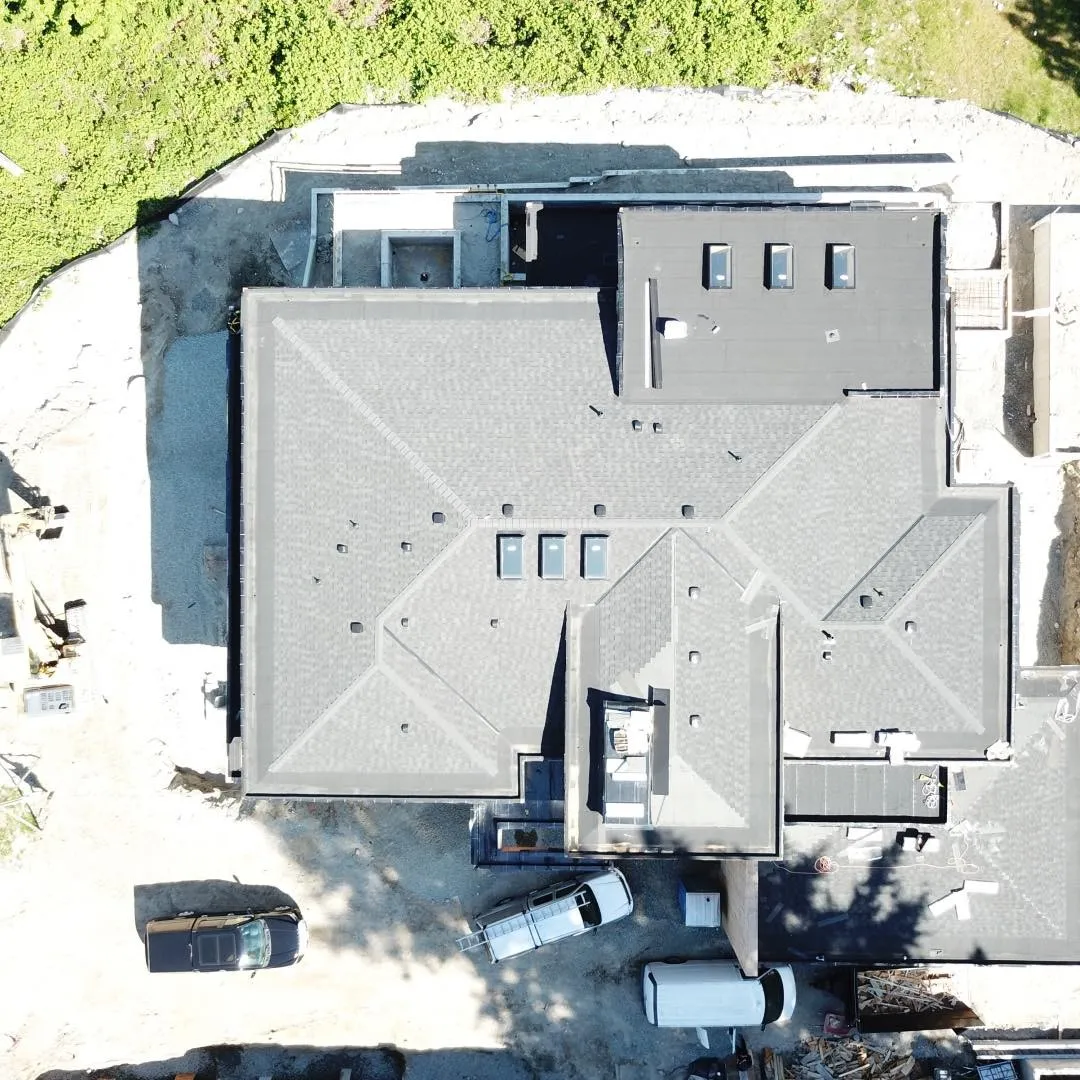 Aerial view of architectural shingle and flat roof — commercial property, Surrey BC