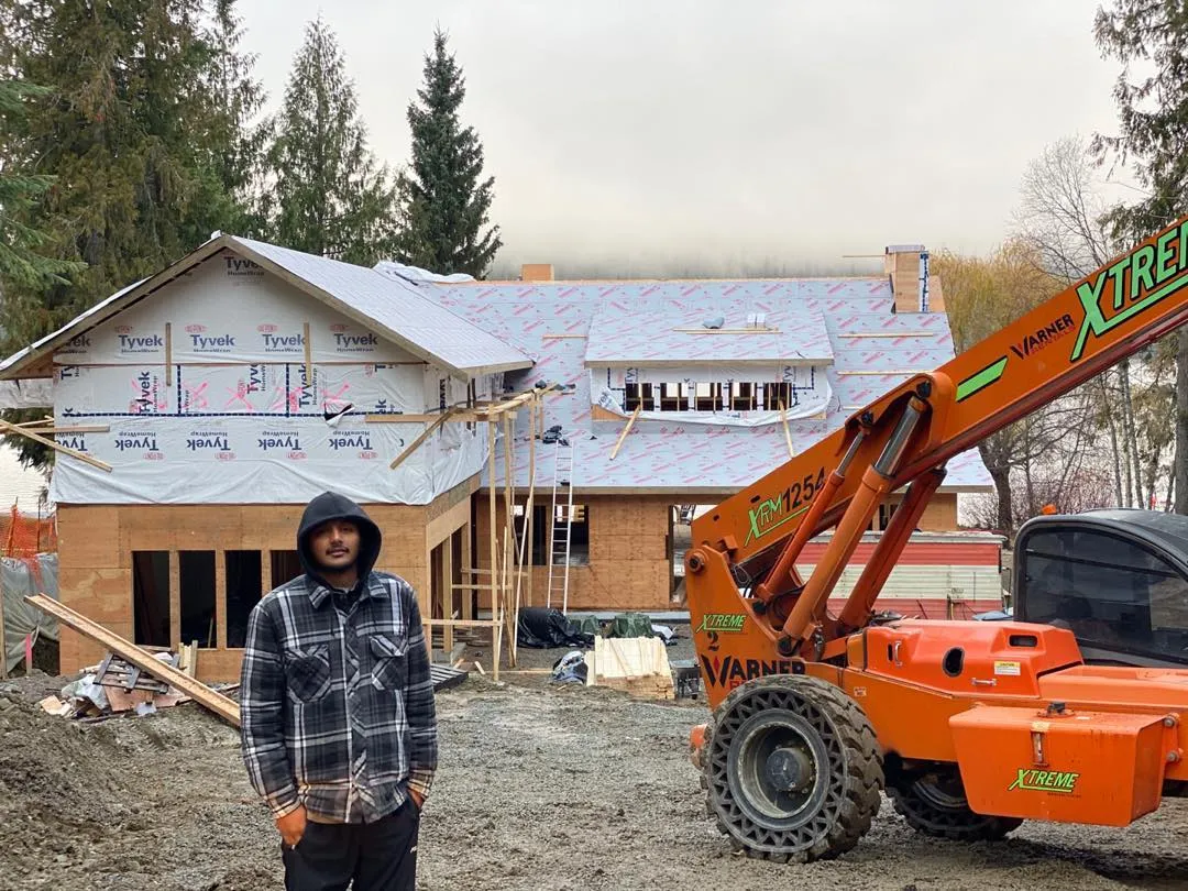 Active Roofing crew on a completed roofing job in Surrey, BC