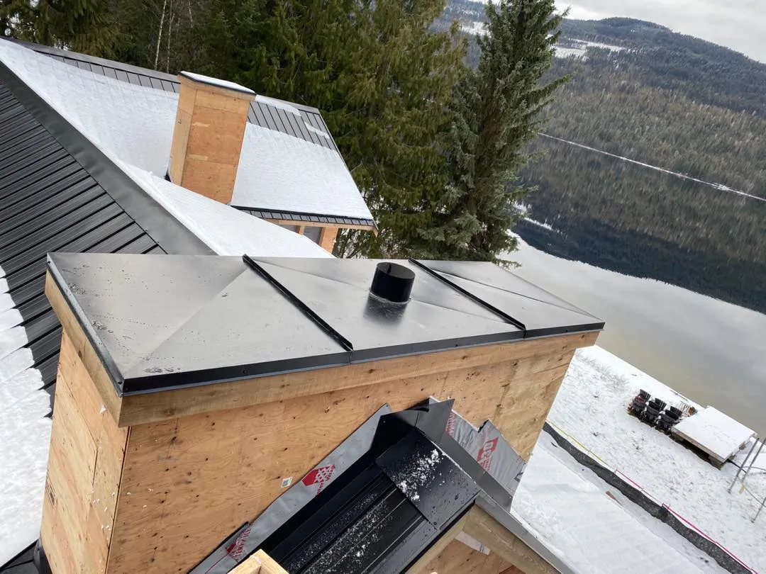 Black standing seam metal roof installation — Surrey, BC