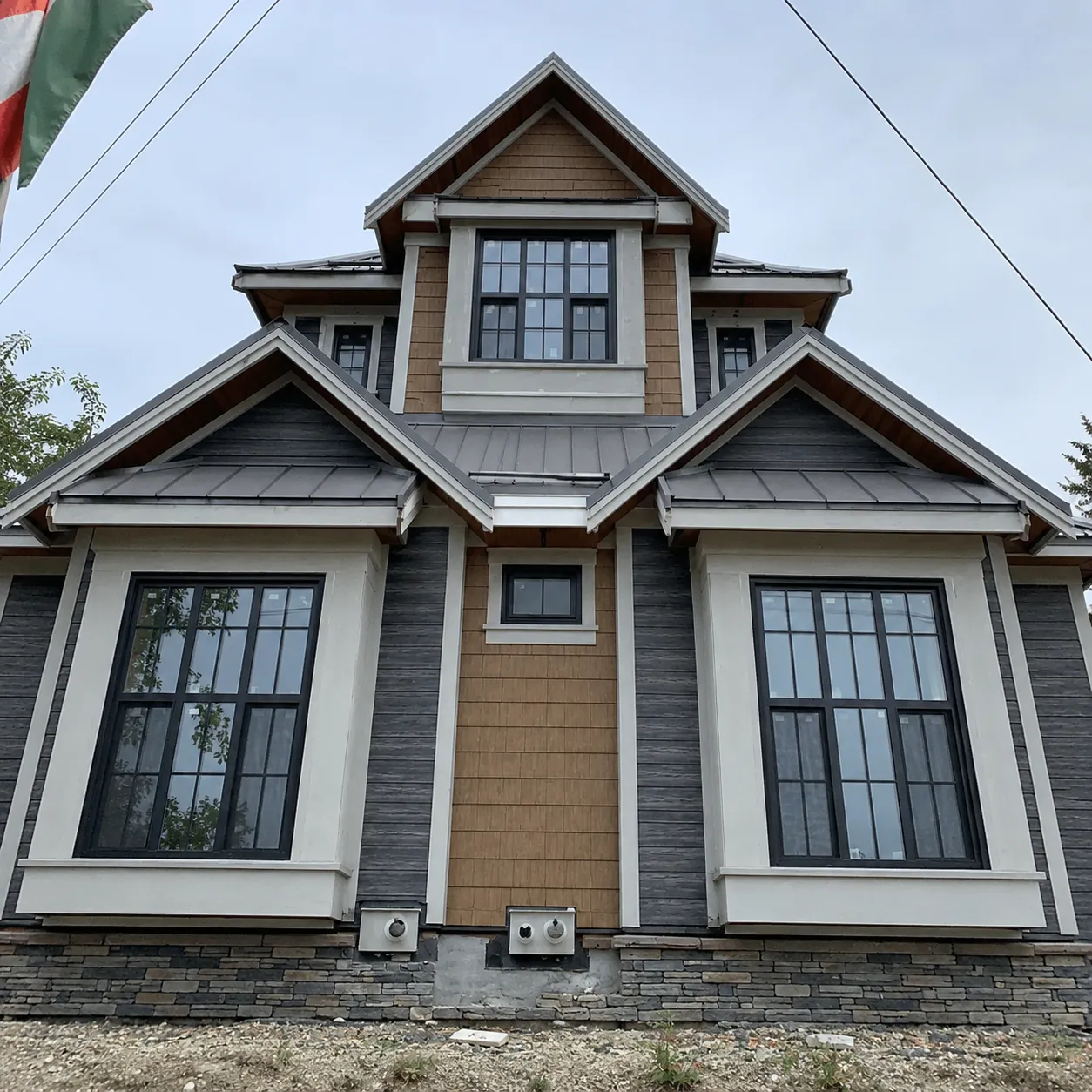 Front view of a completed metal roof installation — Surrey, BC